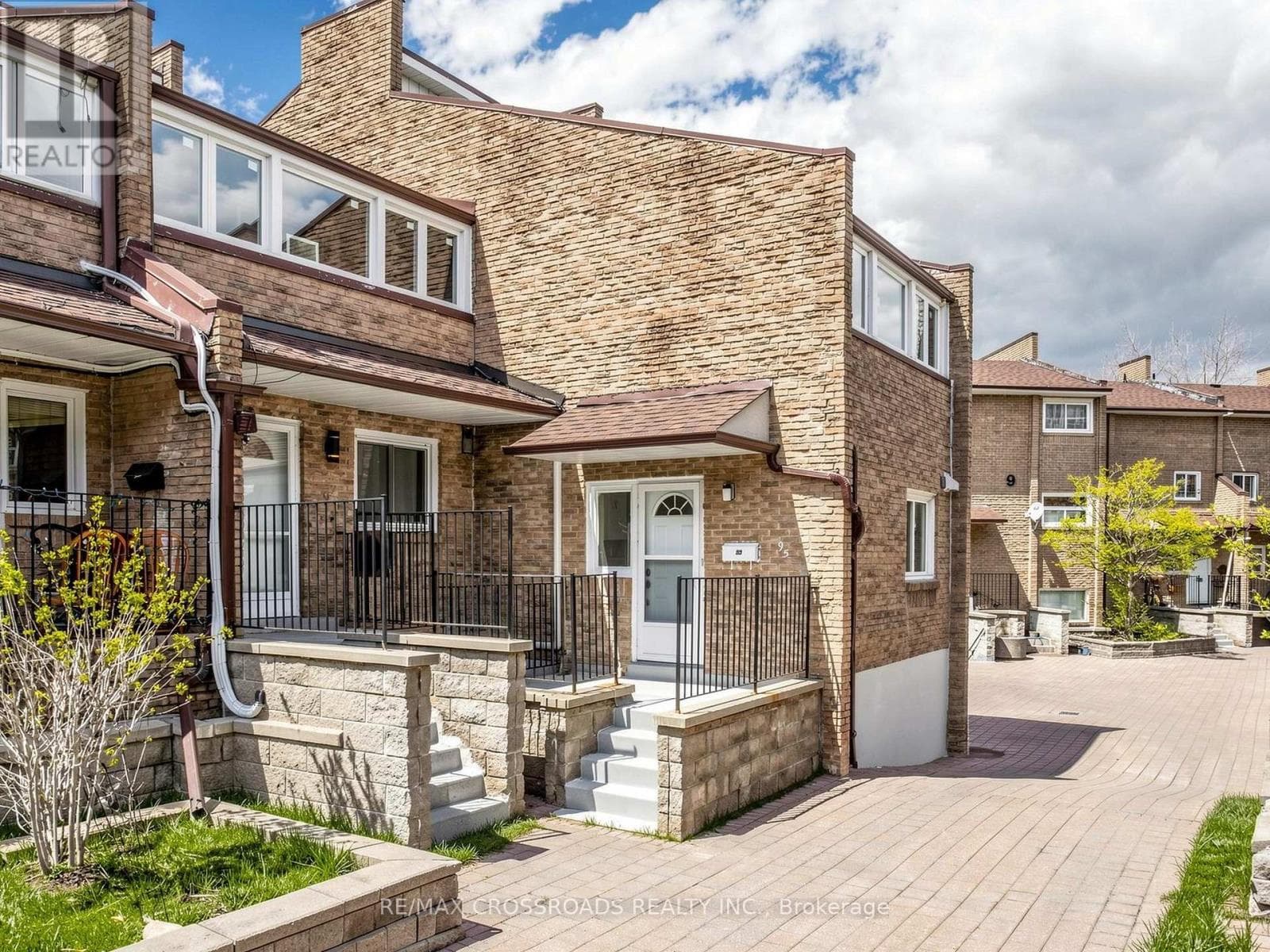 Corner condo townhouse in Scarborough Village with value-add renovation upside