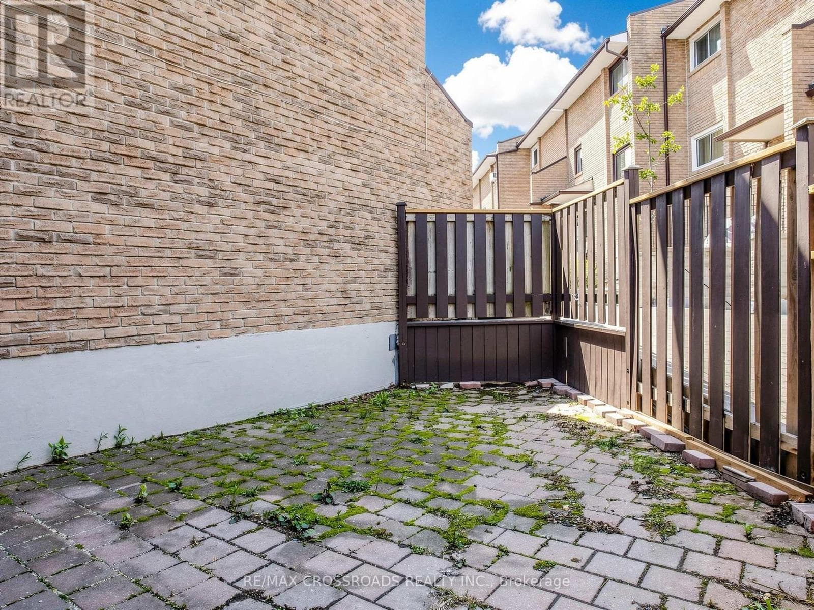 Corner condo townhouse in Scarborough Village with value-add renovation upside 30