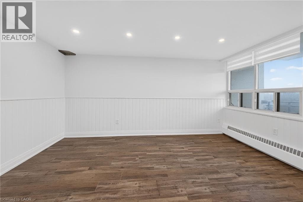 Renovated 2-bed corner condo in Kerr Village, steps to Lake Ontario, listed at $499,999 10
