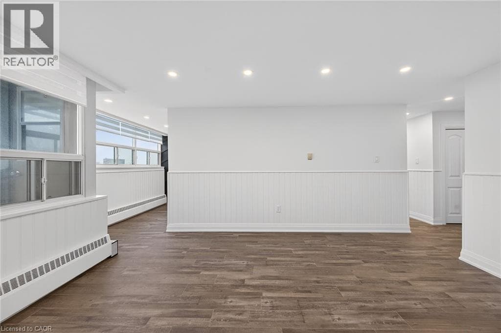 Renovated 2-bed corner condo in Kerr Village, steps to Lake Ontario, listed at $499,999 12