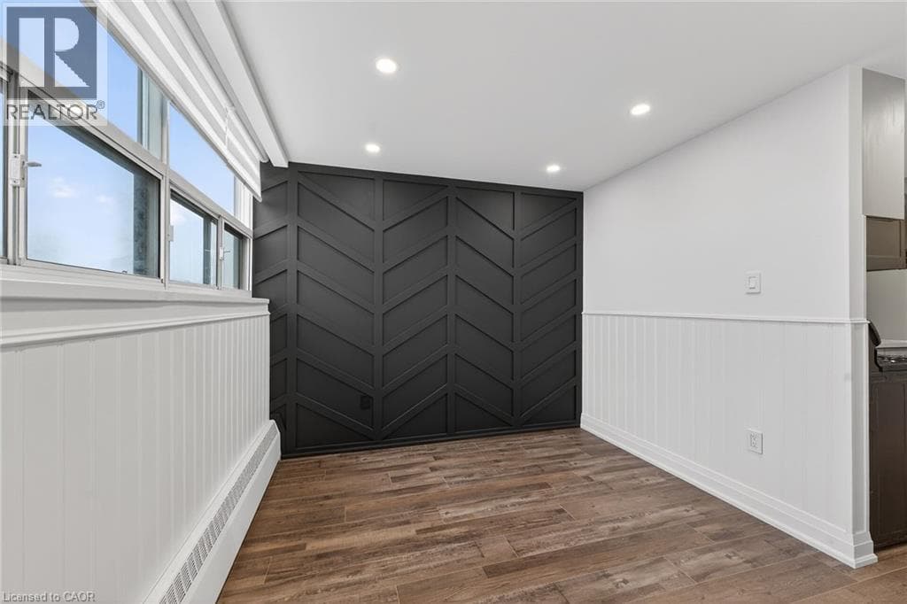 Renovated 2-bed corner condo in Kerr Village, steps to Lake Ontario, listed at $499,999 13