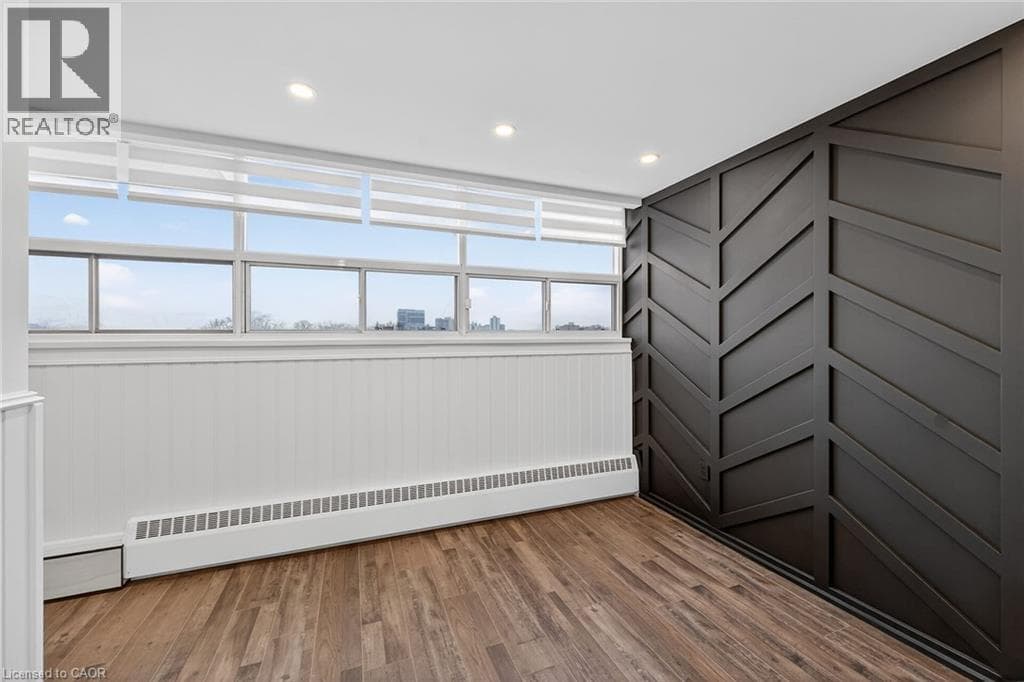 Renovated 2-bed corner condo in Kerr Village, steps to Lake Ontario, listed at $499,999 14