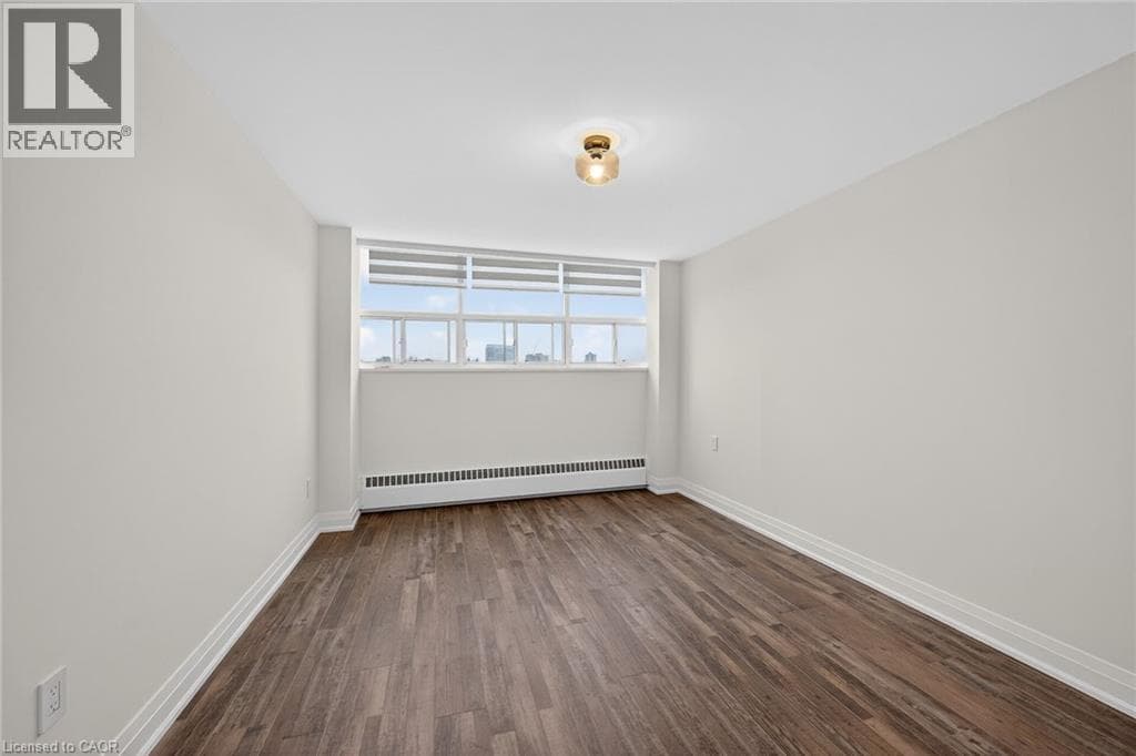 Renovated 2-bed corner condo in Kerr Village, steps to Lake Ontario, listed at $499,999 20
