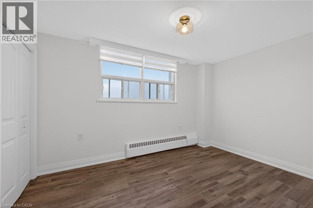 Renovated 2-bed corner condo in Kerr Village, steps to Lake Ontario, listed at $499,999 22