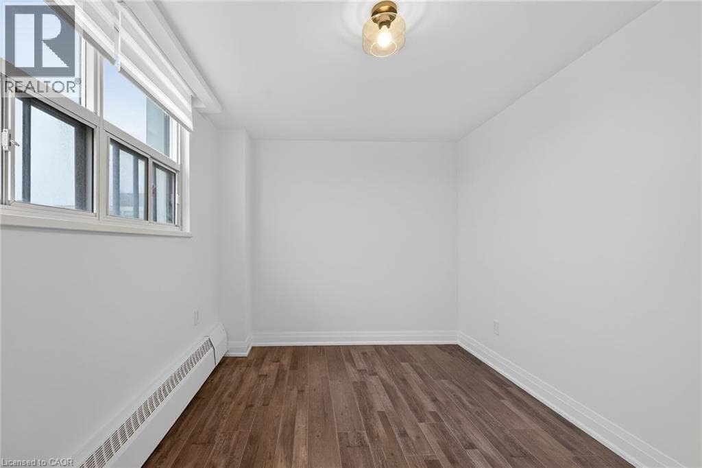Renovated 2-bed corner condo in Kerr Village, steps to Lake Ontario, listed at $499,999 23