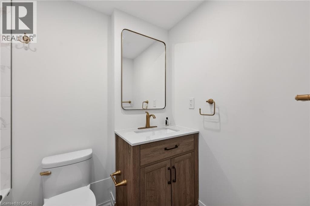 Renovated 2-bed corner condo in Kerr Village, steps to Lake Ontario, listed at $499,999 25