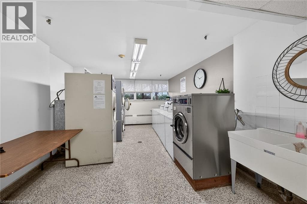 Renovated 2-bed corner condo in Kerr Village, steps to Lake Ontario, listed at $499,999 33