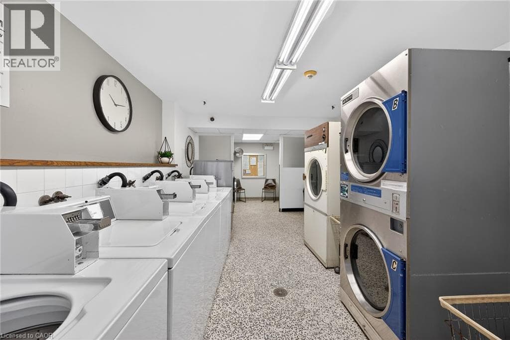 Renovated 2-bed corner condo in Kerr Village, steps to Lake Ontario, listed at $499,999 34
