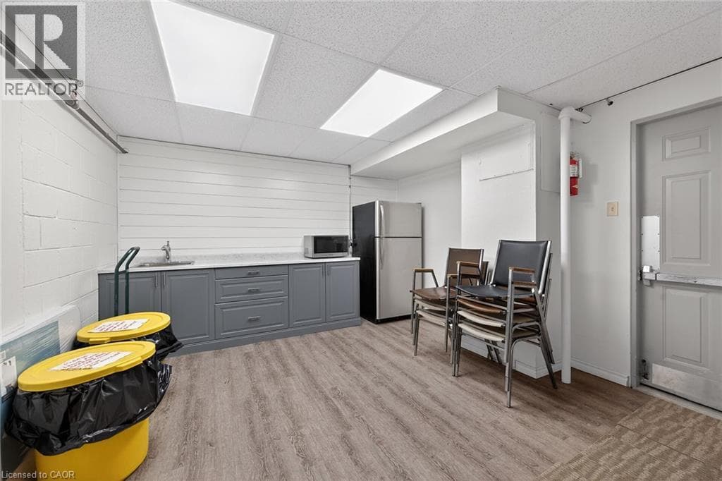Renovated 2-bed corner condo in Kerr Village, steps to Lake Ontario, listed at $499,999 40