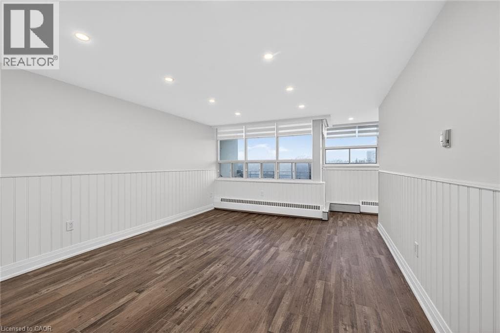 Renovated 2-bed corner condo in Kerr Village, steps to Lake Ontario, listed at $499,999 9
