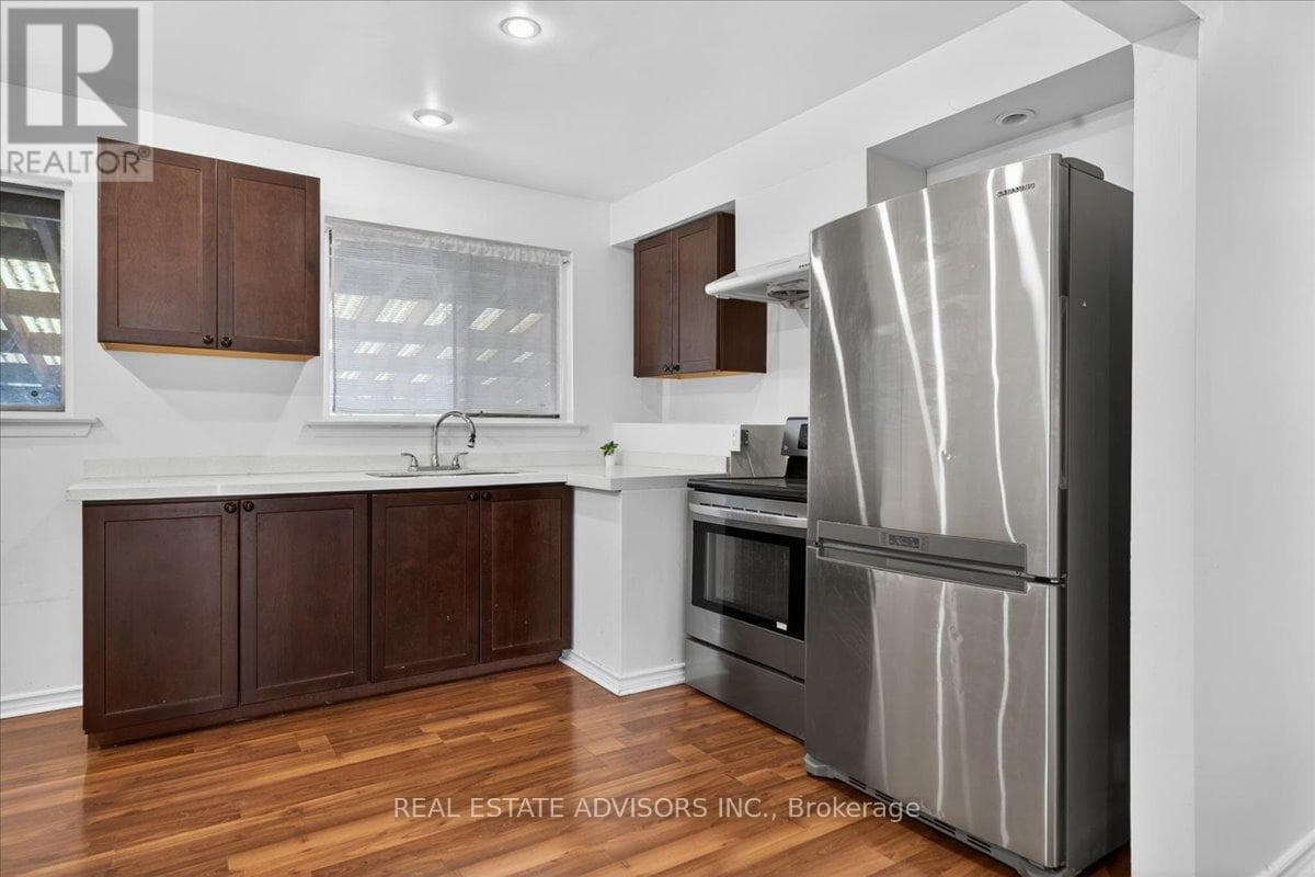 Large Brampton East bungalow with separate side entrance and second basement kitchen 17