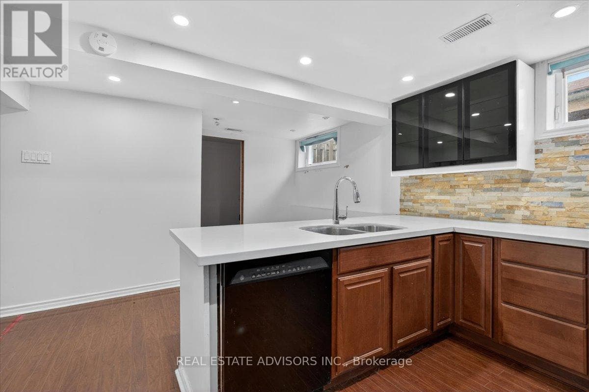 Large Brampton East bungalow with separate side entrance and second basement kitchen 26