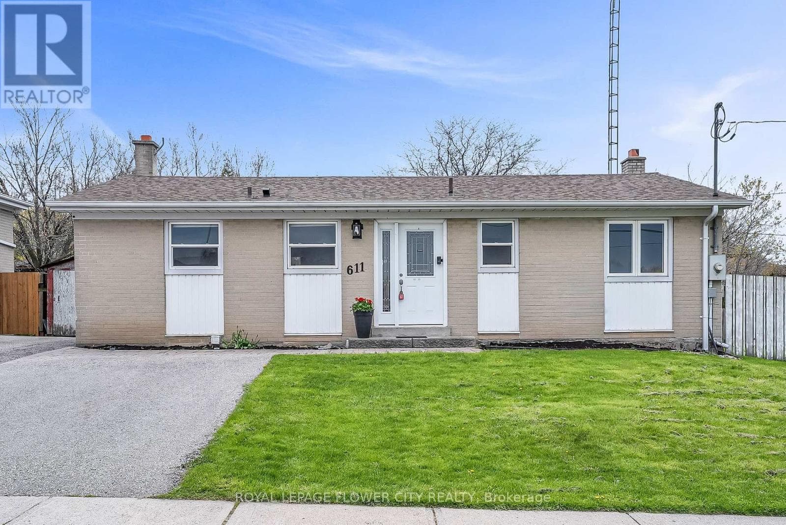 All-brick Whitby bungalow with separate-entrance basement suite on 70x100 lot