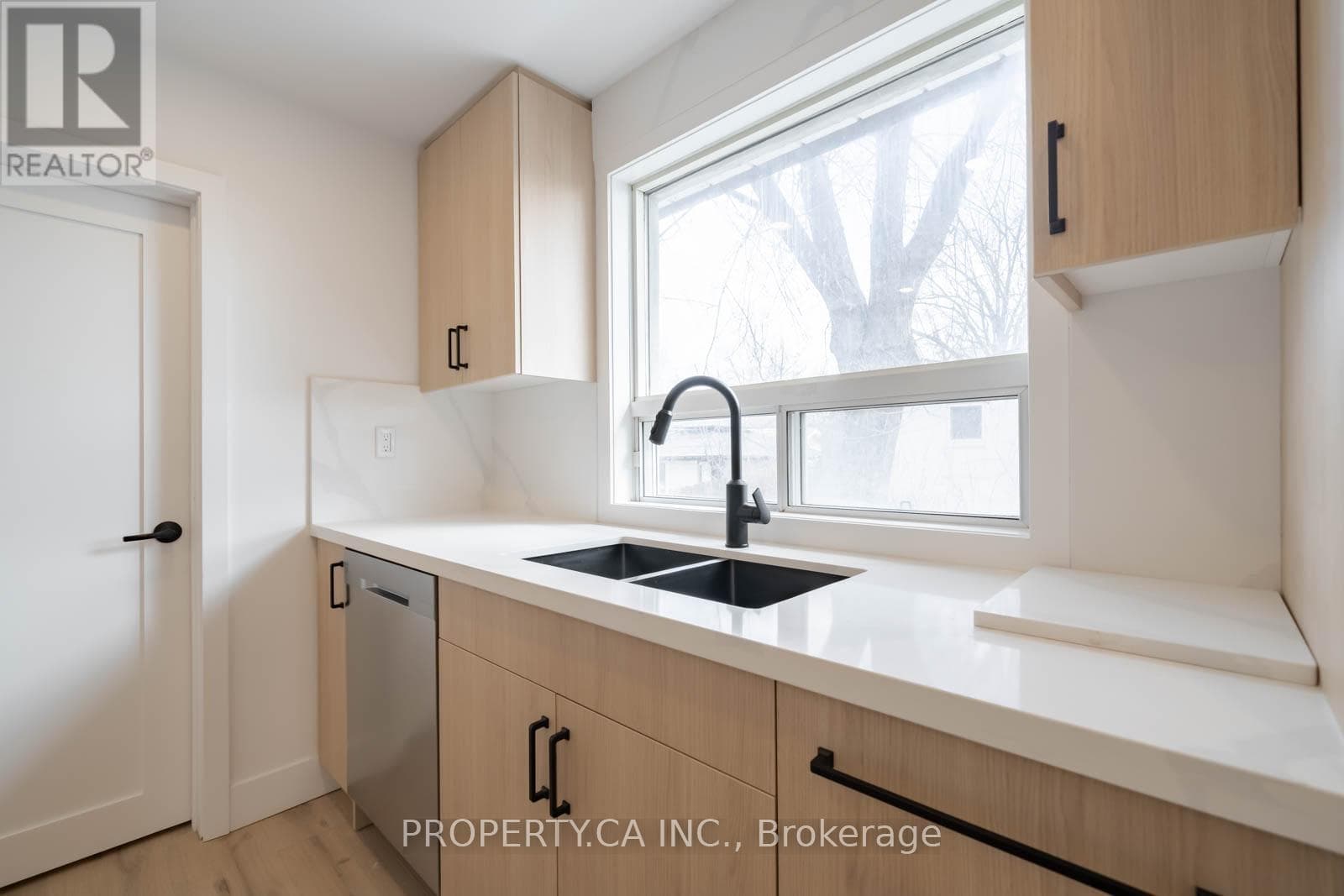 Renovated Downtown Brampton bungalow with basement-suite conversion potential, walk to GO 14