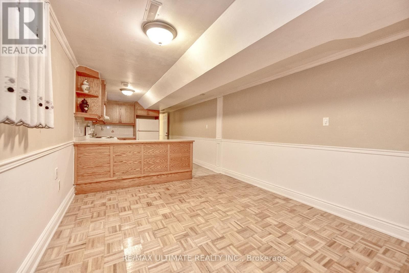 Detached Rockcliffe-Smythe bungalow with basement apartment, deep 15 x 150 ft lot 15