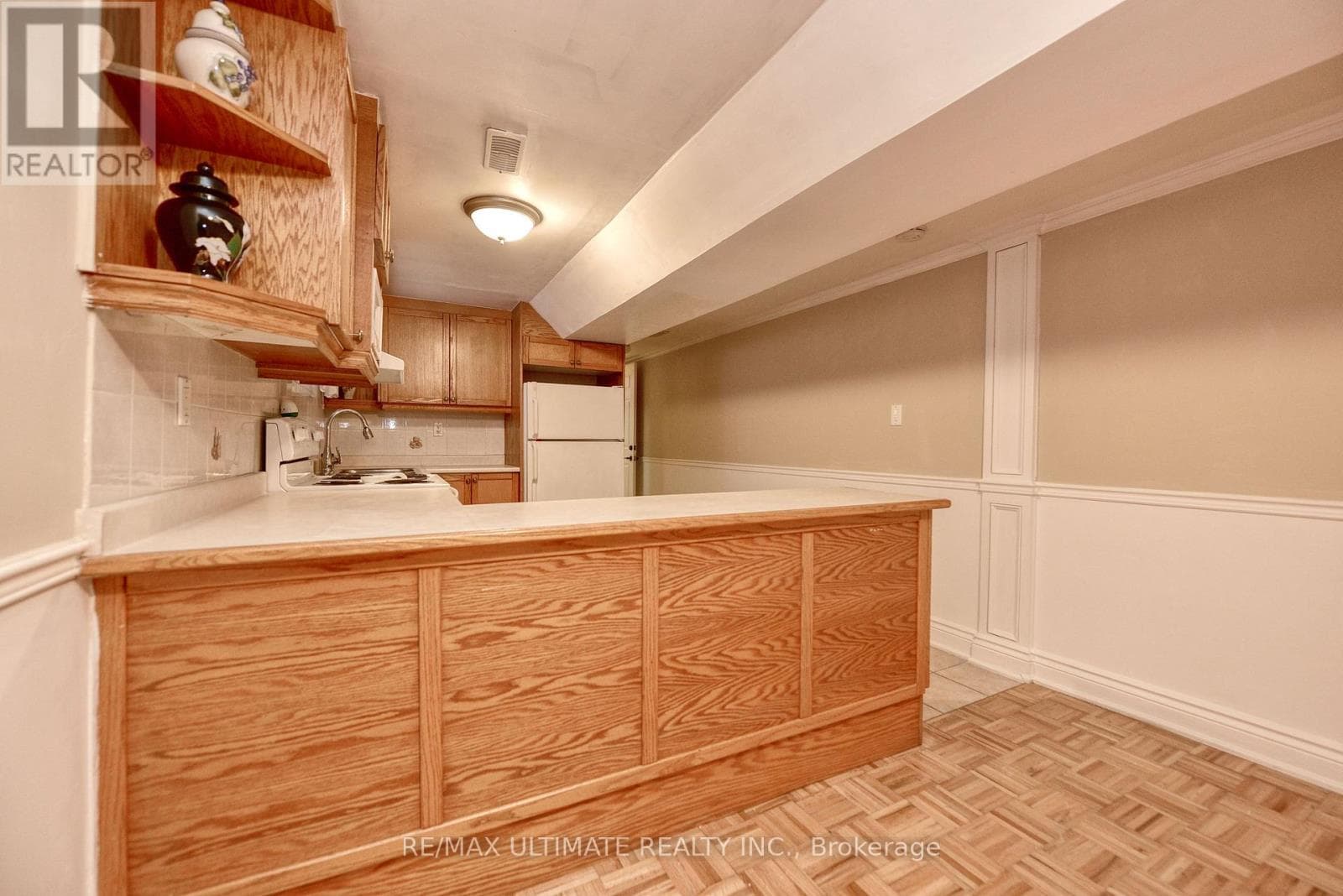 Detached Rockcliffe-Smythe bungalow with basement apartment, deep 15 x 150 ft lot 21