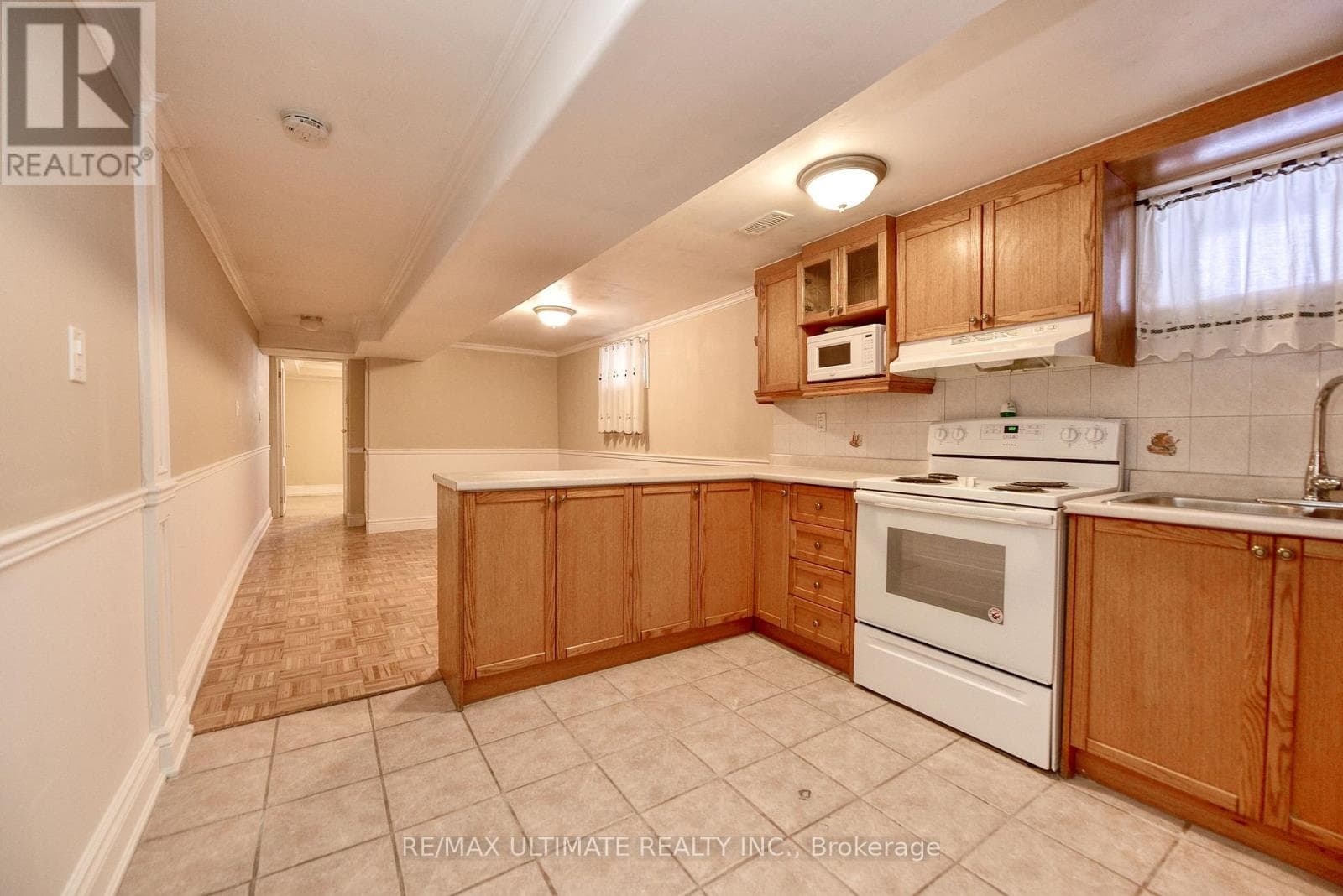 Detached Rockcliffe-Smythe bungalow with basement apartment, deep 15 x 150 ft lot 22