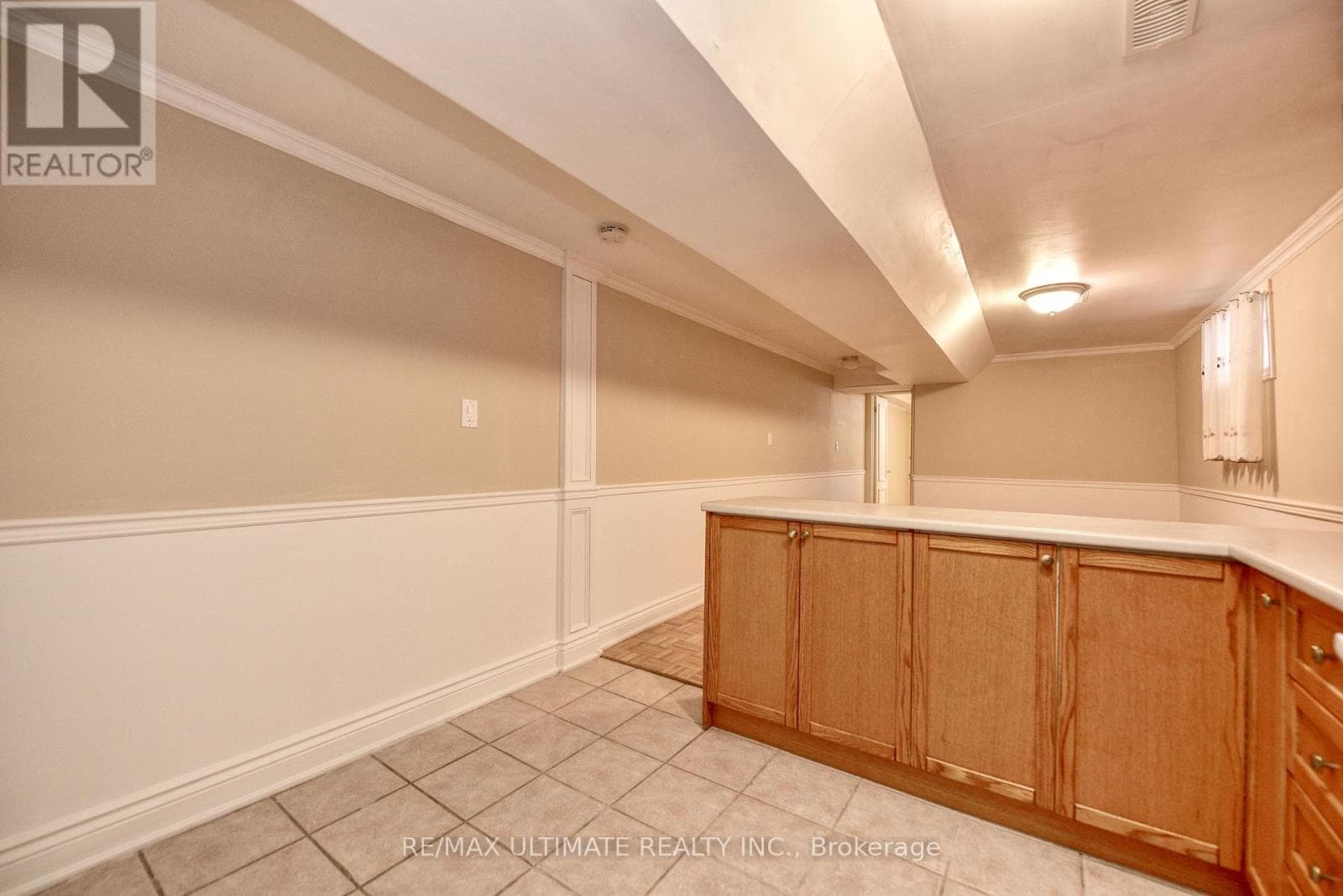 Detached Rockcliffe-Smythe bungalow with basement apartment, deep 15 x 150 ft lot 23