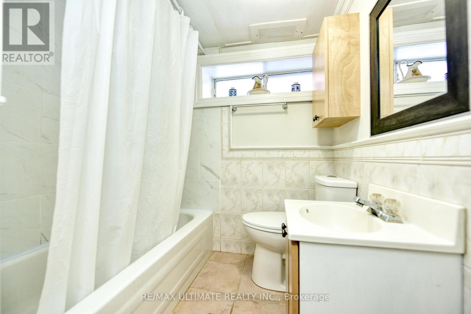 Detached Rockcliffe-Smythe bungalow with basement apartment, deep 15 x 150 ft lot 24