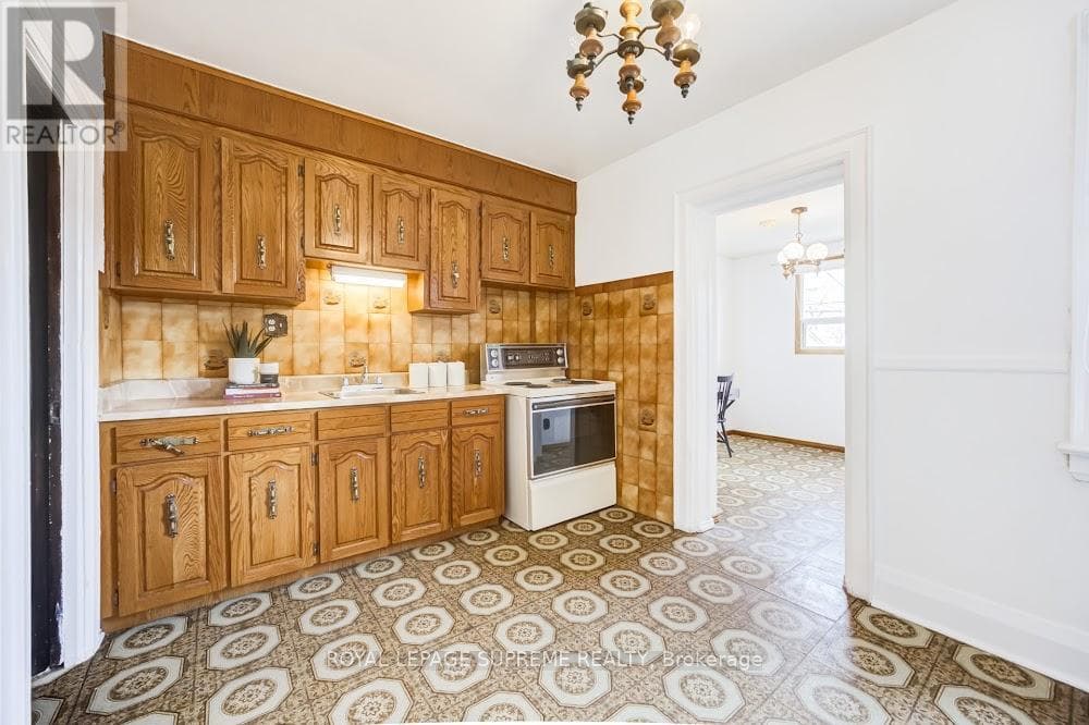 Detached Dovercourt Village home with laneway garage and Garden Suite potential near Bloor subway 11
