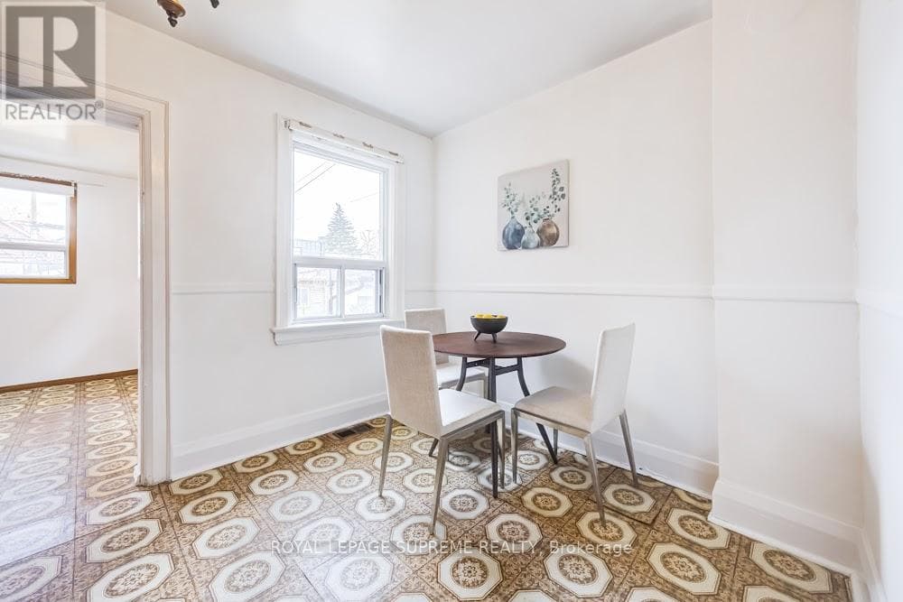 Detached Dovercourt Village home with laneway garage and Garden Suite potential near Bloor subway 9