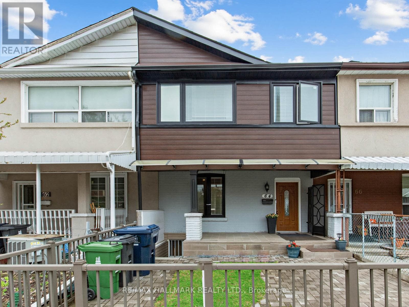 3+1 bed Danforth townhouse steps to Donlands Subway with double laneway garage