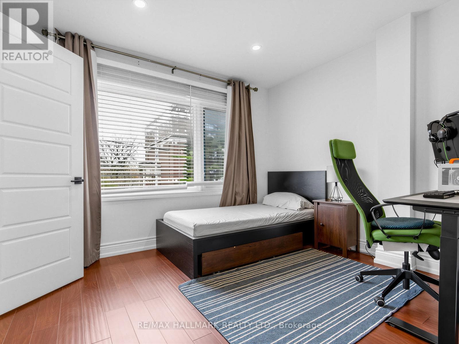 3+1 bed Danforth townhouse steps to Donlands Subway with double laneway garage 20