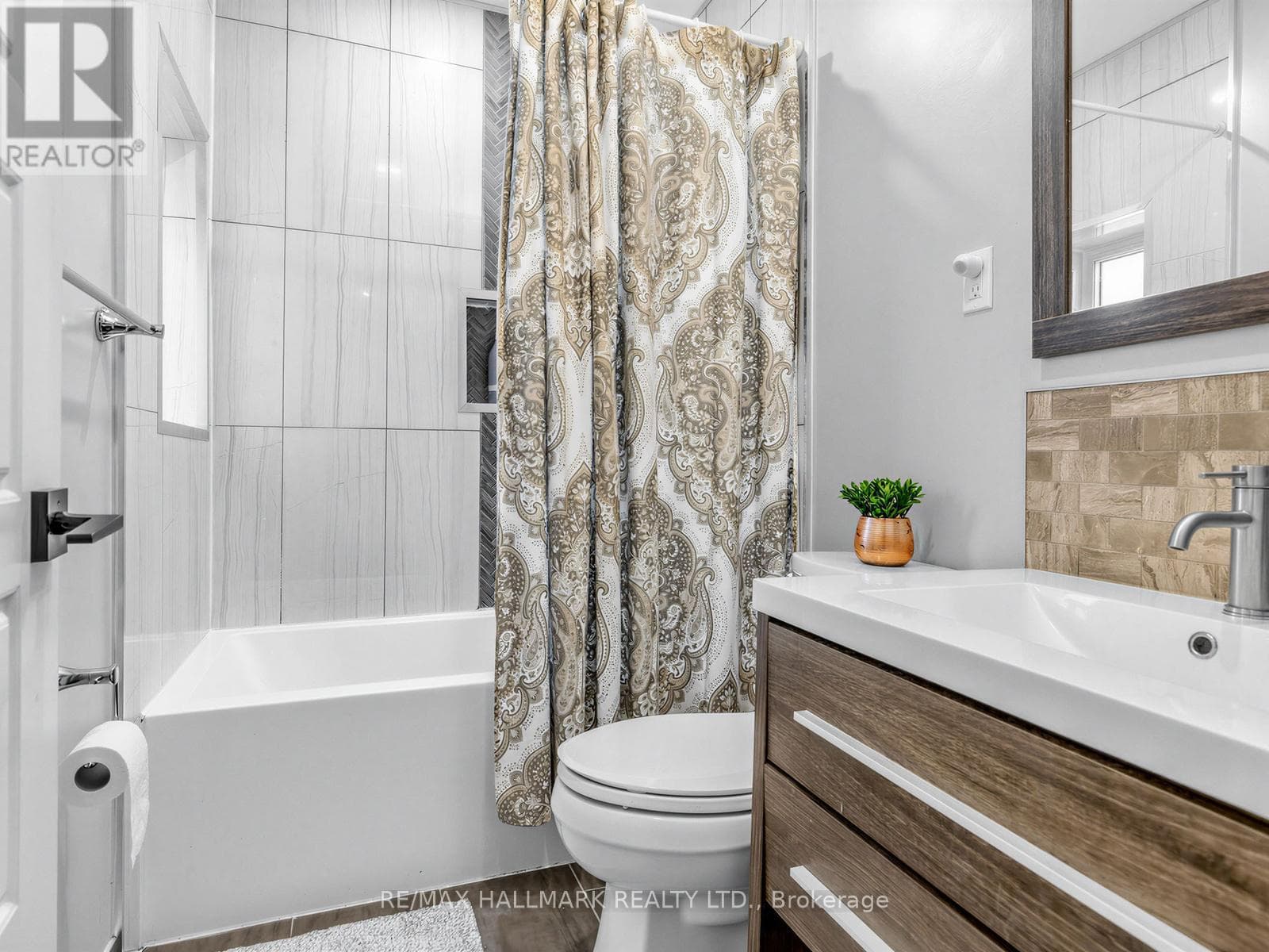 3+1 bed Danforth townhouse steps to Donlands Subway with double laneway garage 26
