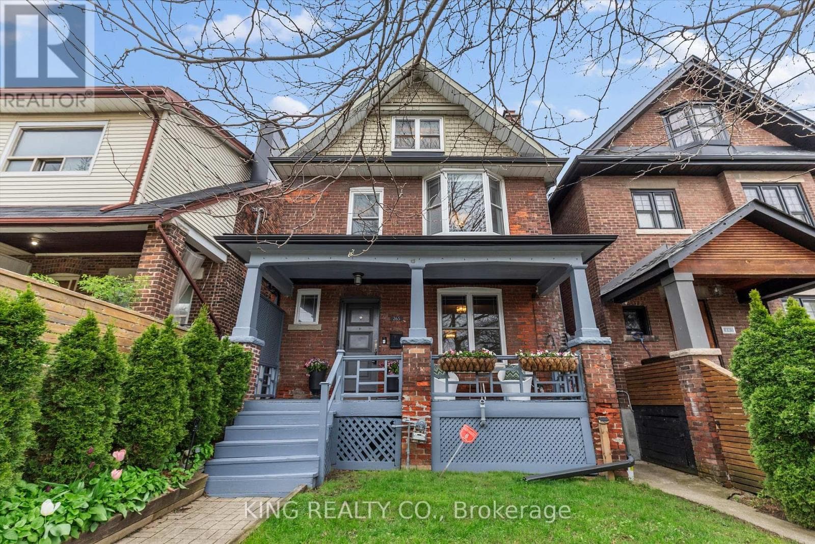 Detached Oakwood Village 4-bed with legal-style basement suite on 125-foot L-shaped lot