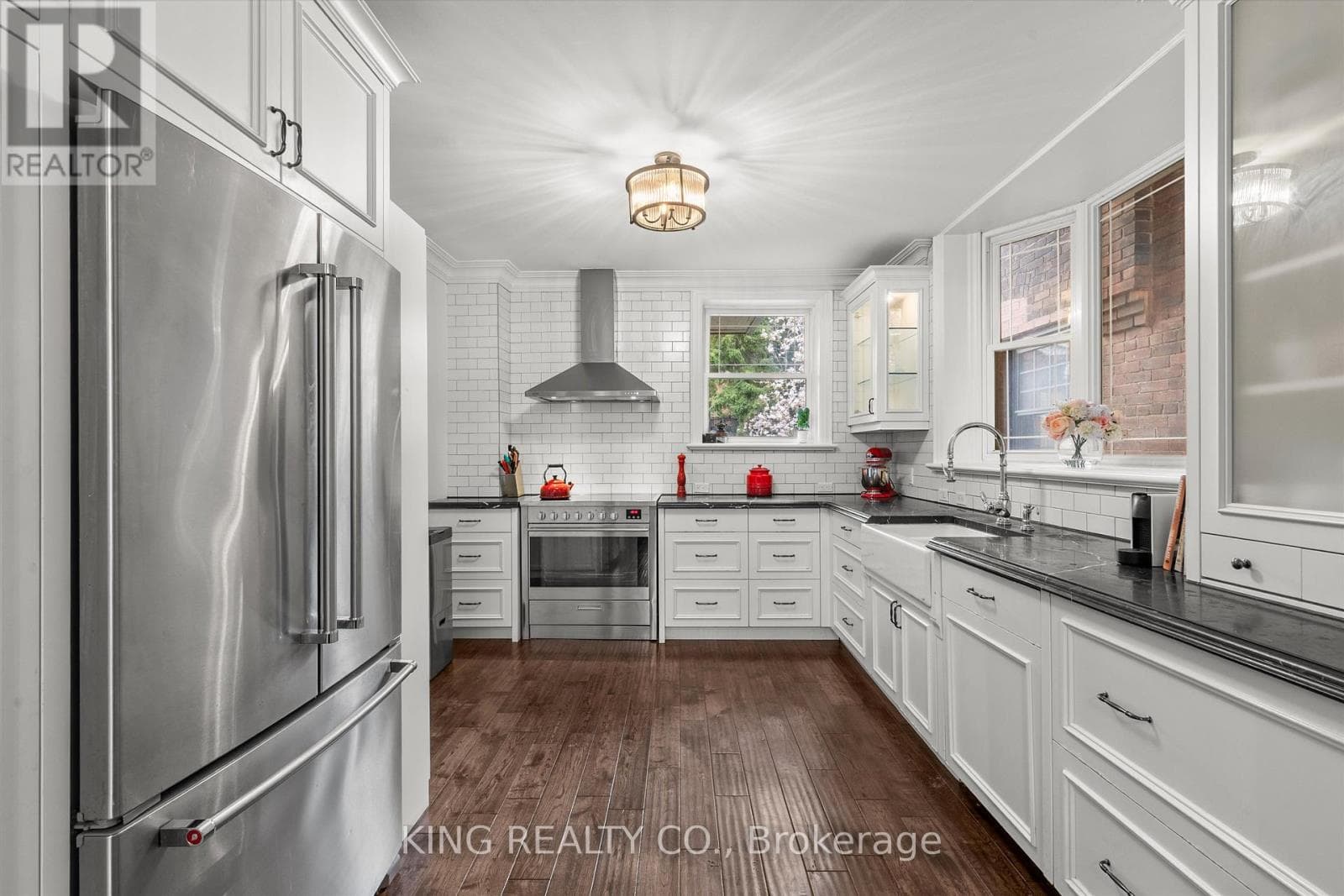 Detached Oakwood Village 4-bed with legal-style basement suite on 125-foot L-shaped lot 10