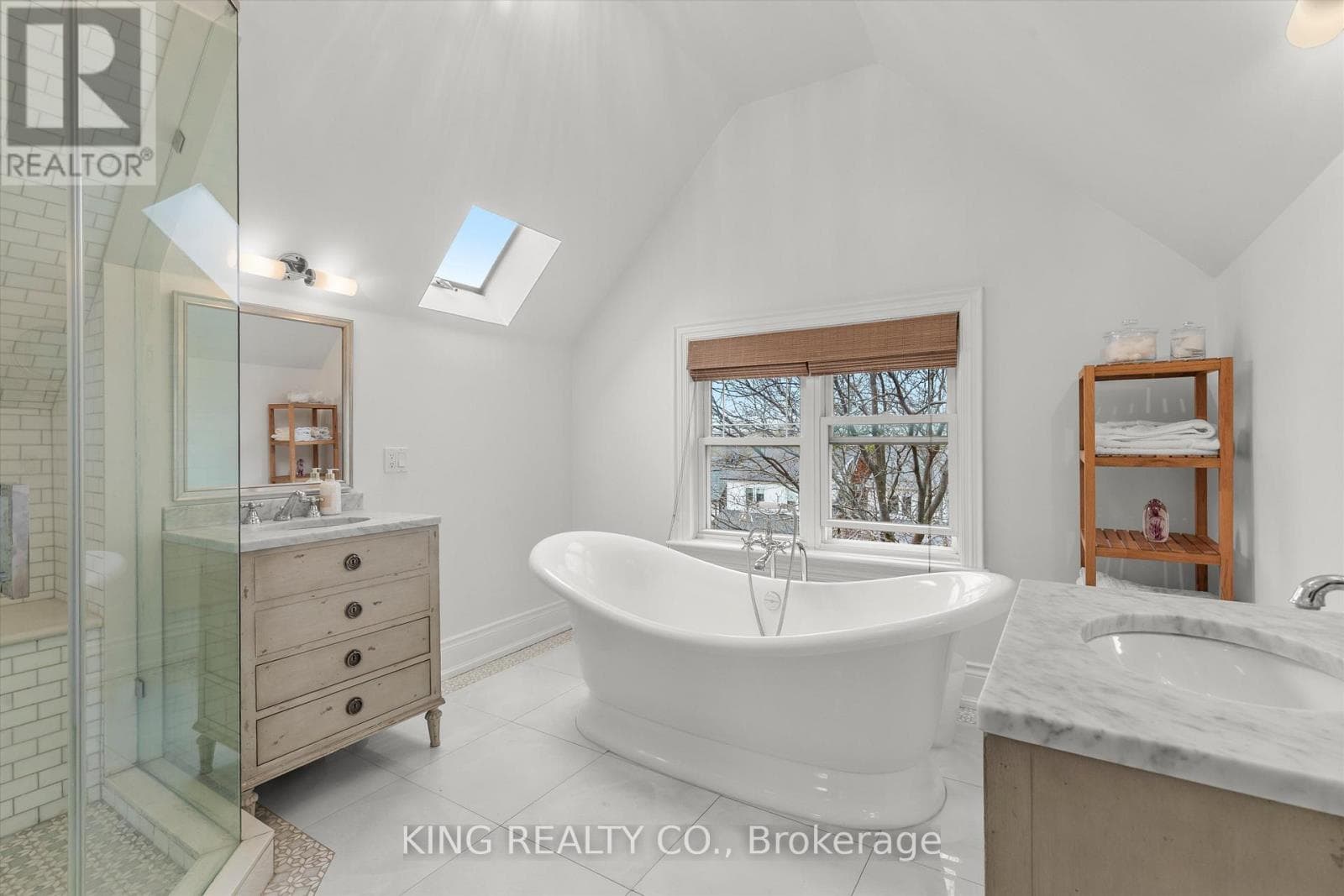 Detached Oakwood Village 4-bed with legal-style basement suite on 125-foot L-shaped lot 16