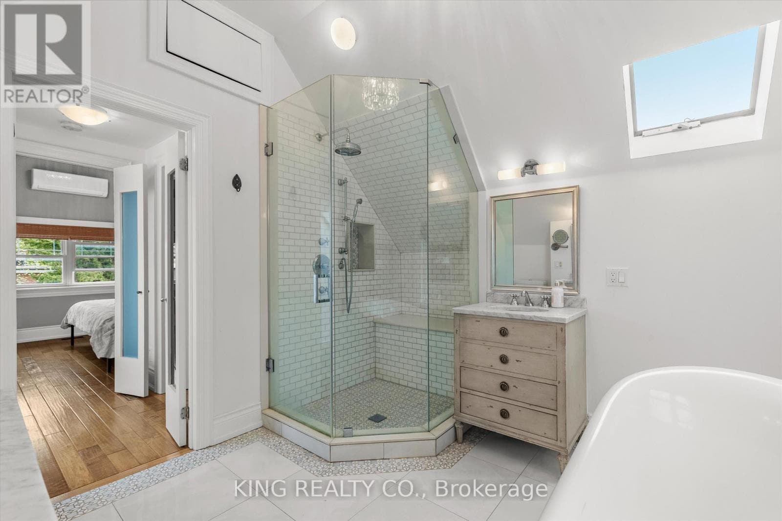 Detached Oakwood Village 4-bed with legal-style basement suite on 125-foot L-shaped lot 17
