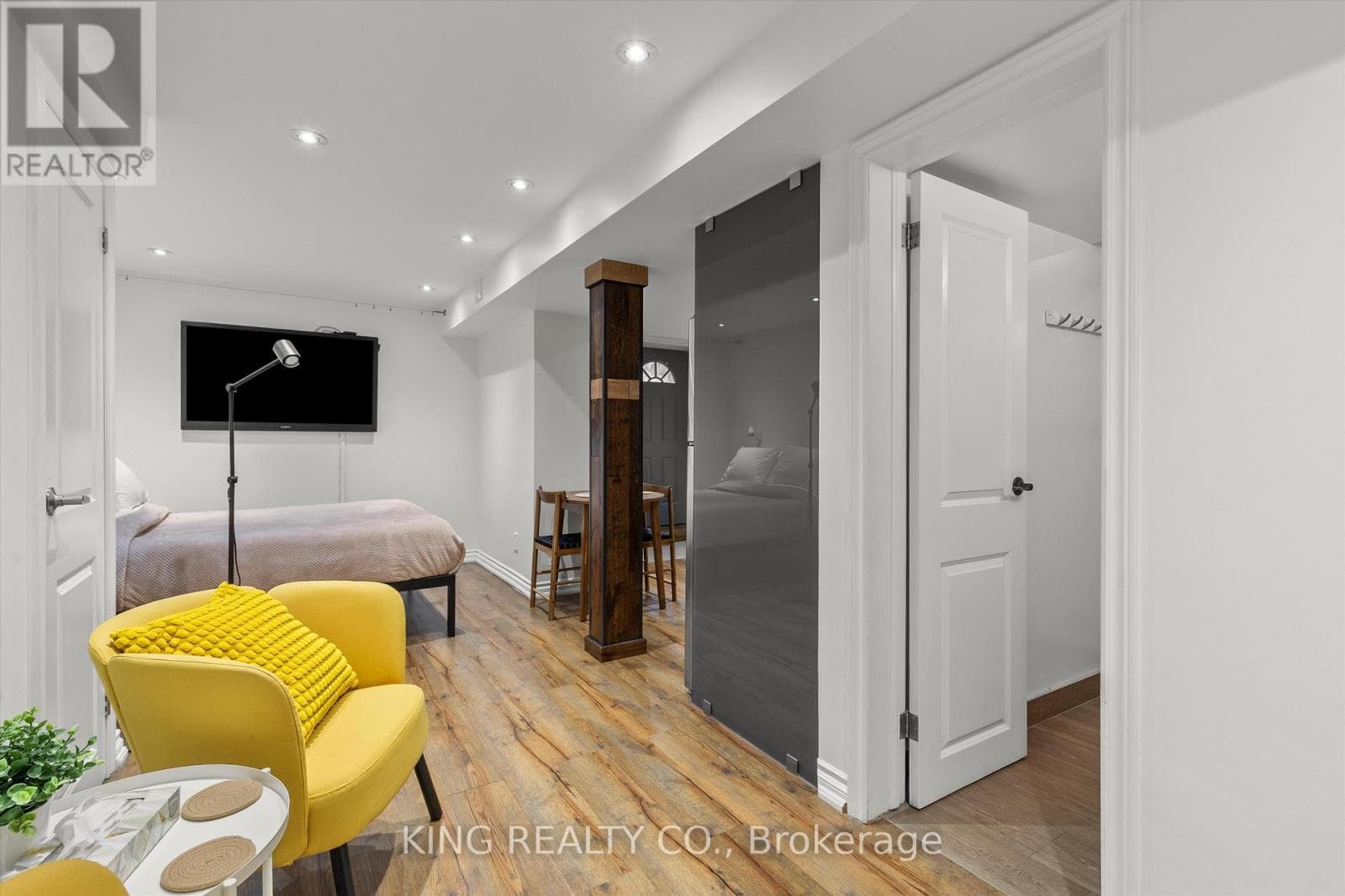Detached Oakwood Village 4-bed with legal-style basement suite on 125-foot L-shaped lot 25