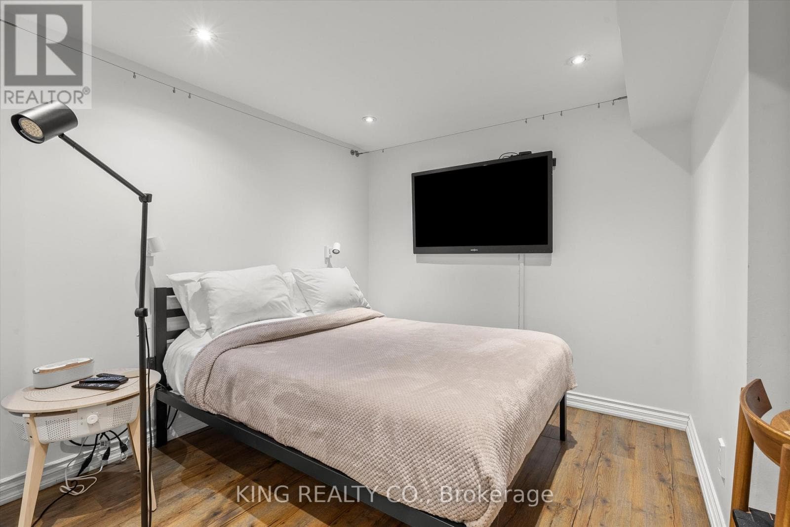 Detached Oakwood Village 4-bed with legal-style basement suite on 125-foot L-shaped lot 26