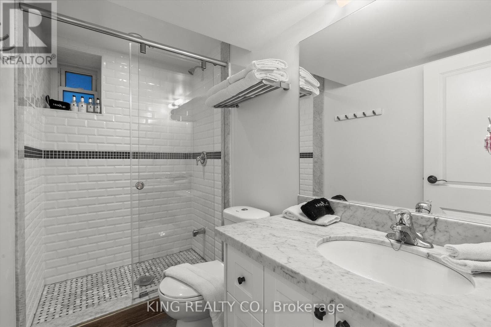 Detached Oakwood Village 4-bed with legal-style basement suite on 125-foot L-shaped lot 27