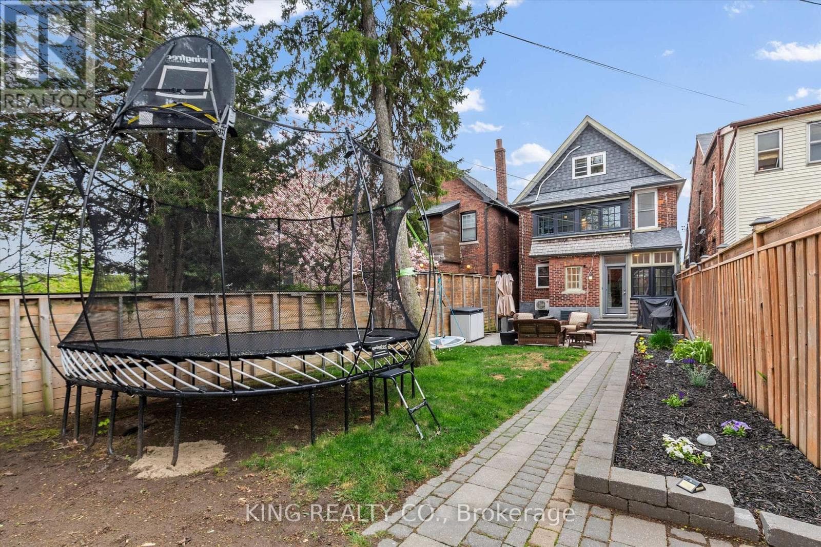 Detached Oakwood Village 4-bed with legal-style basement suite on 125-foot L-shaped lot 29