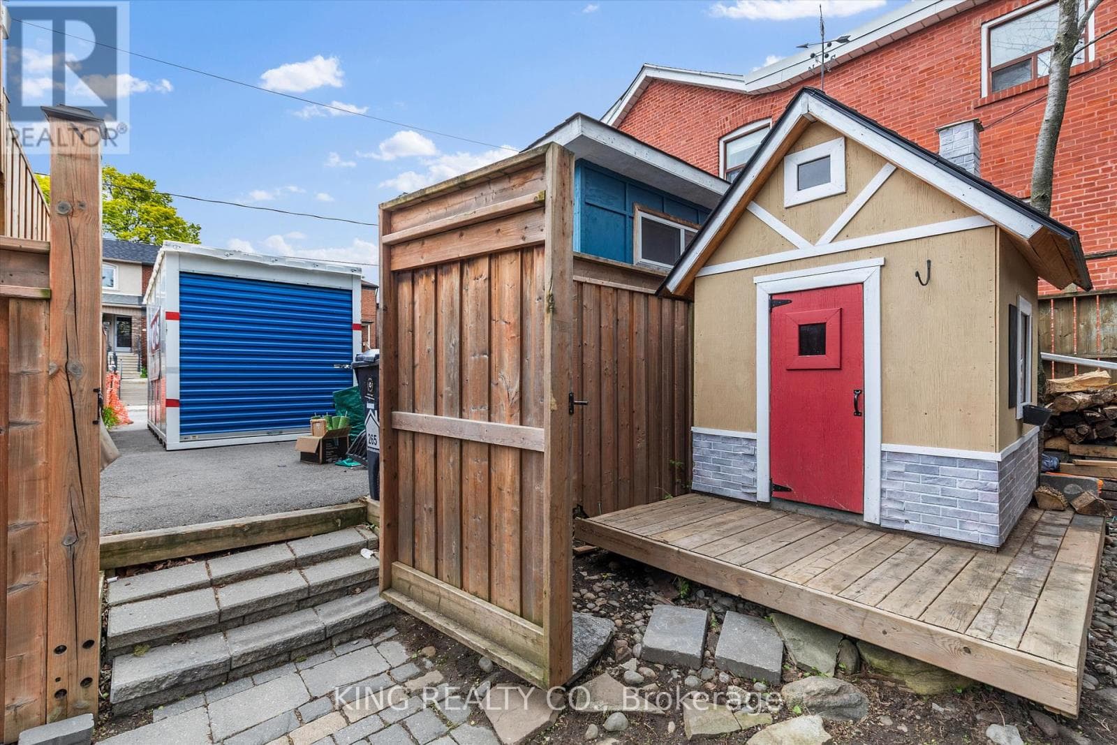 Detached Oakwood Village 4-bed with legal-style basement suite on 125-foot L-shaped lot 30