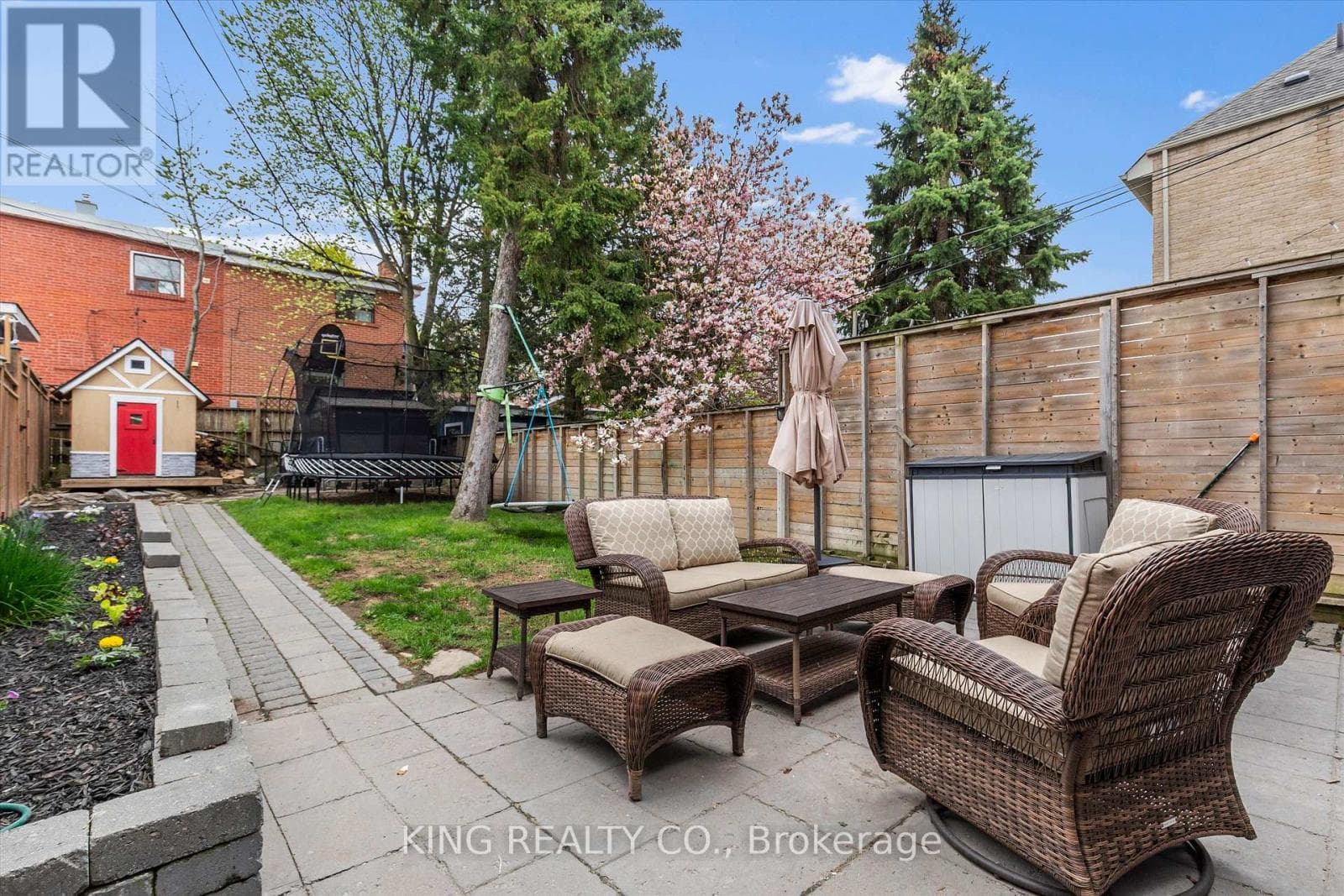 Detached Oakwood Village 4-bed with legal-style basement suite on 125-foot L-shaped lot 31