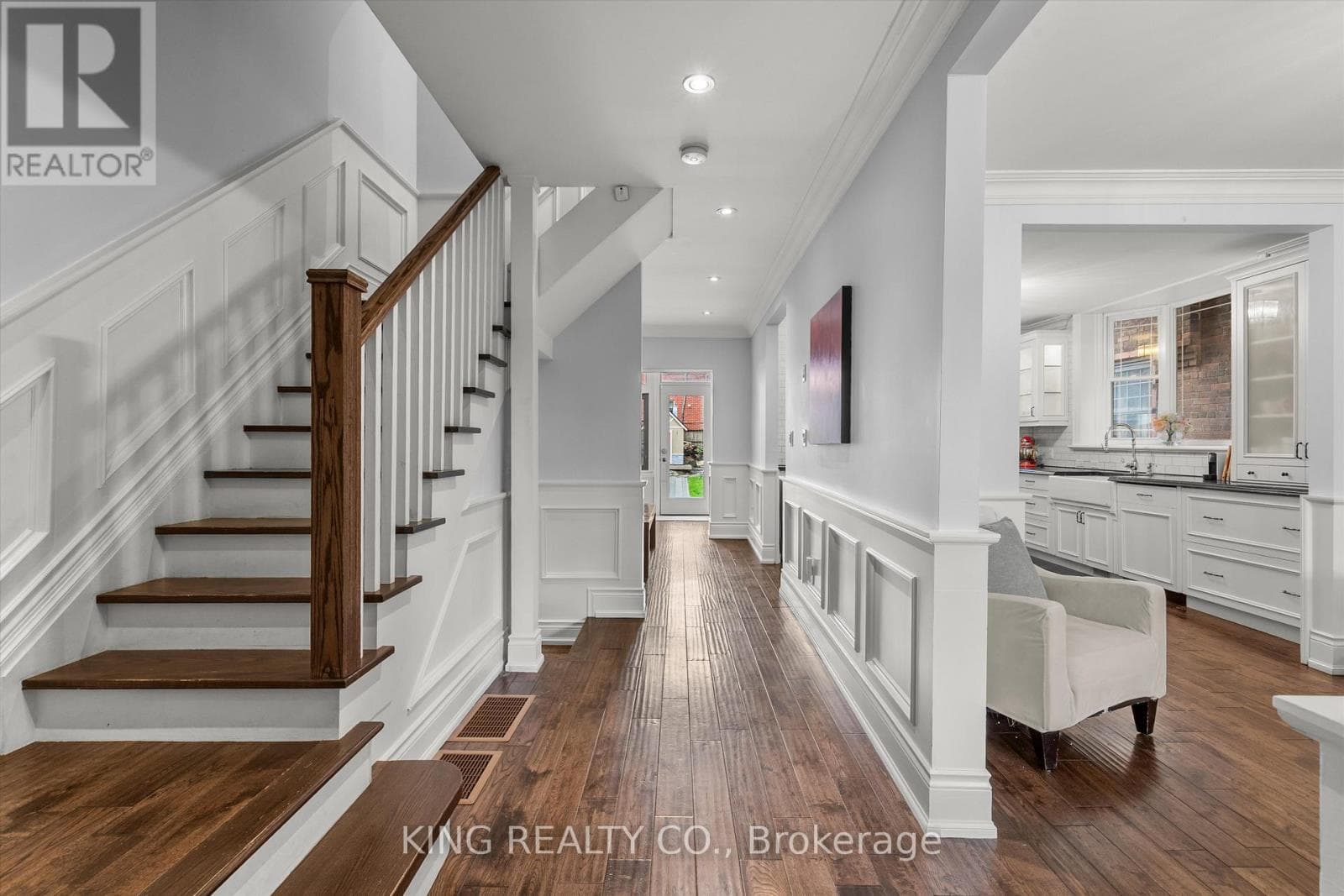 Detached Oakwood Village 4-bed with legal-style basement suite on 125-foot L-shaped lot 4