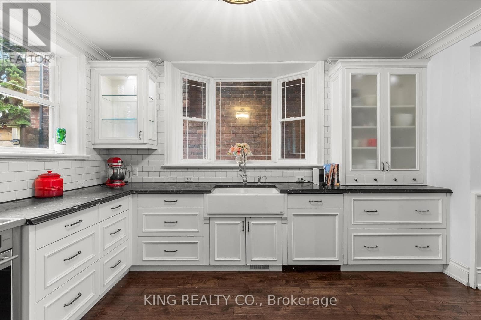 Detached Oakwood Village 4-bed with legal-style basement suite on 125-foot L-shaped lot 8