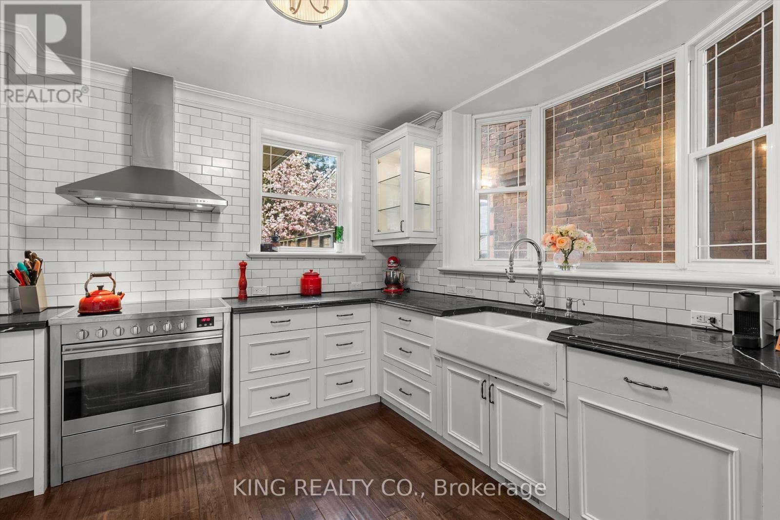 Detached Oakwood Village 4-bed with legal-style basement suite on 125-foot L-shaped lot 9
