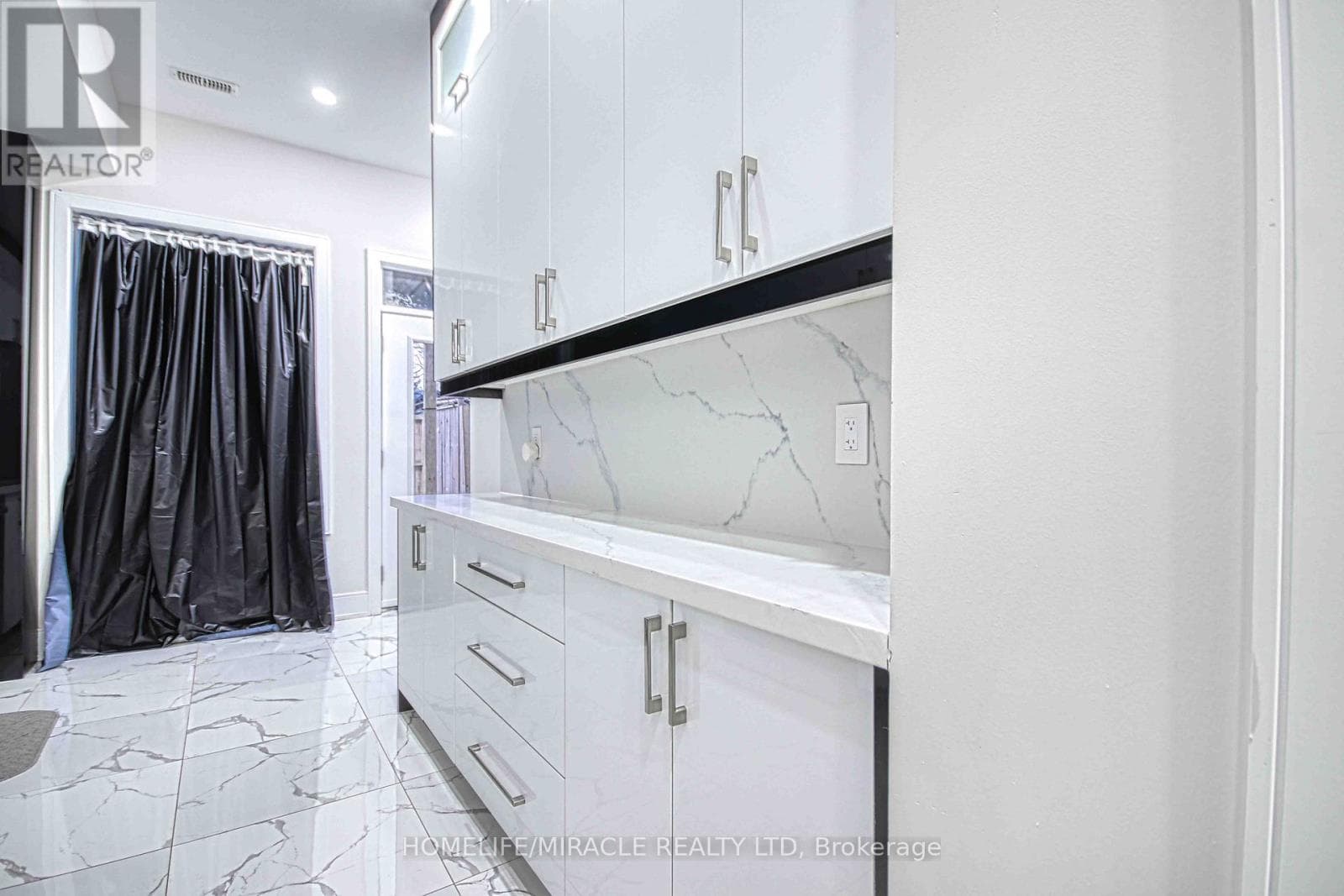 Blake-Jones detached with 3 legal units including new laneway studio, list $1,499,000 12