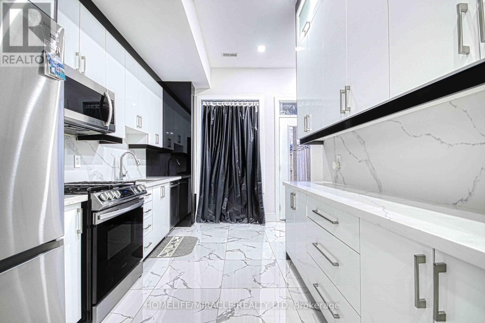 Blake-Jones detached with 3 legal units including new laneway studio, list $1,499,000 13