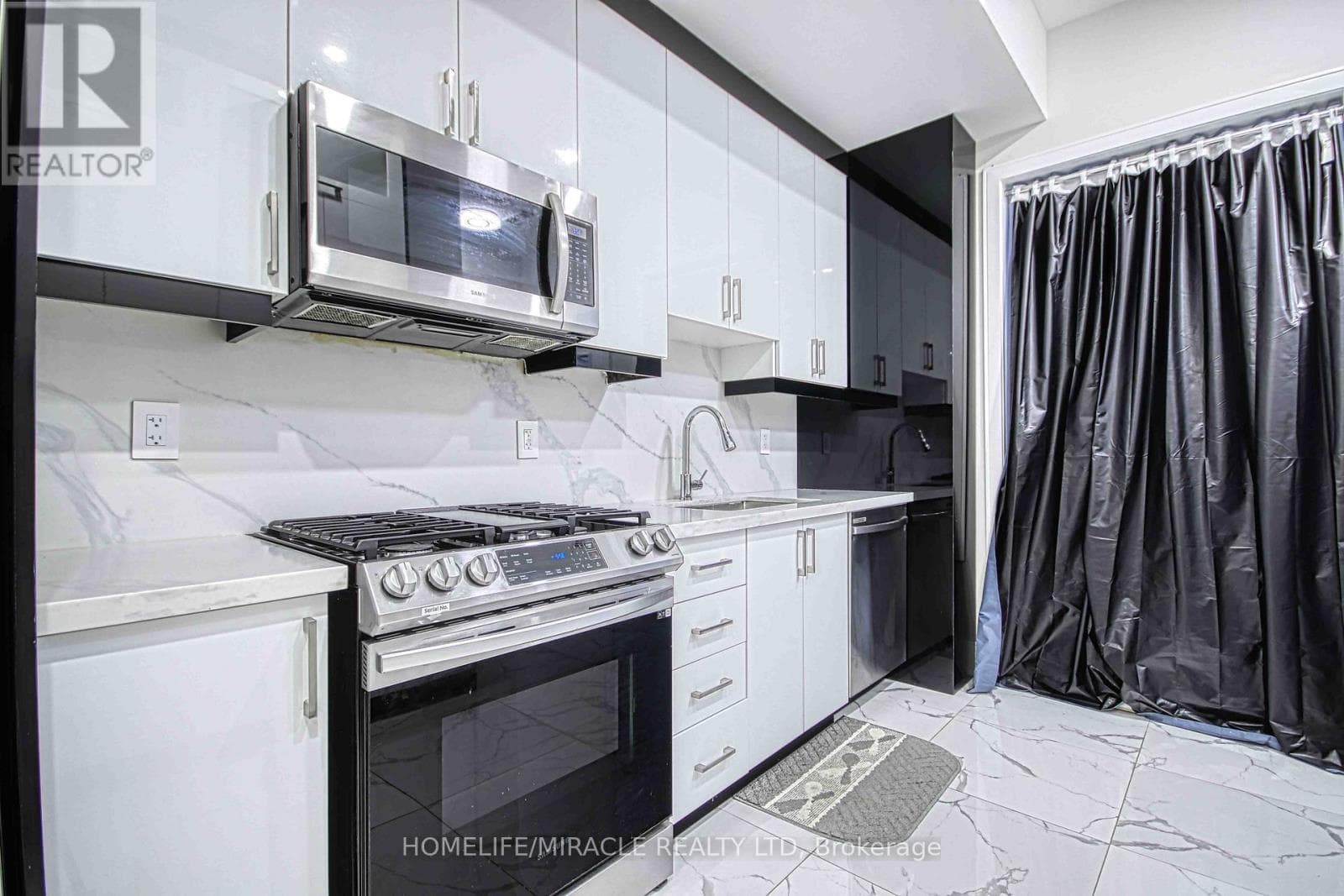 Blake-Jones detached with 3 legal units including new laneway studio, list $1,499,000 14