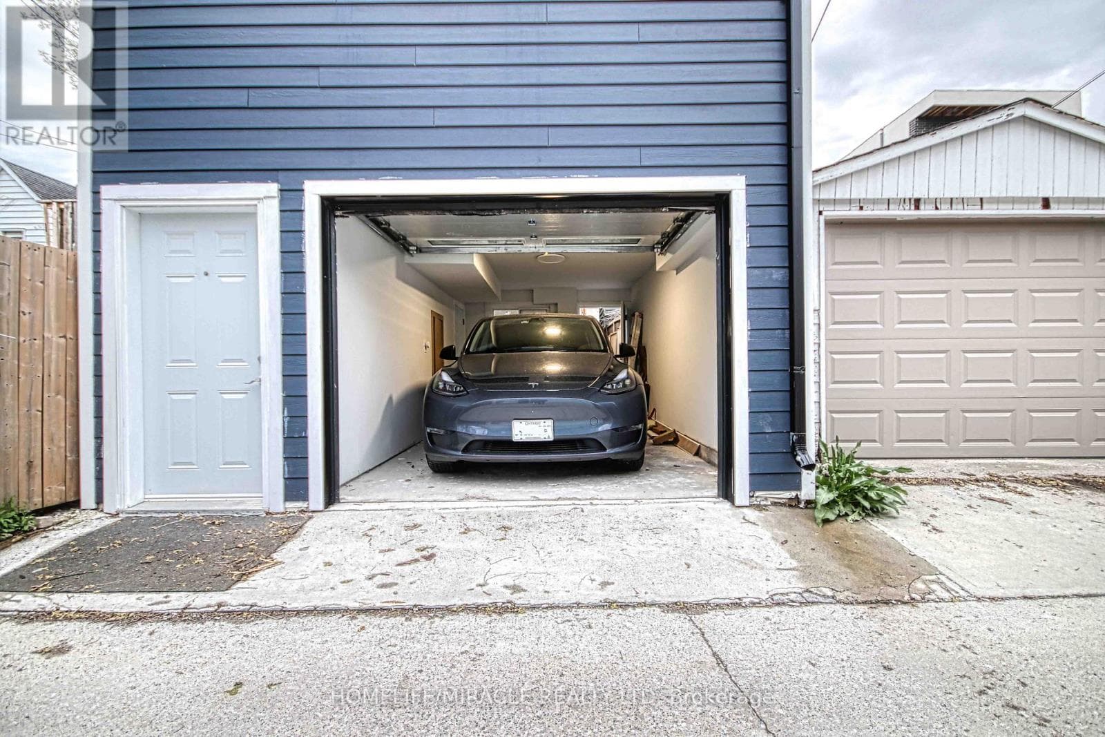 Blake-Jones detached with 3 legal units including new laneway studio, list $1,499,000 25