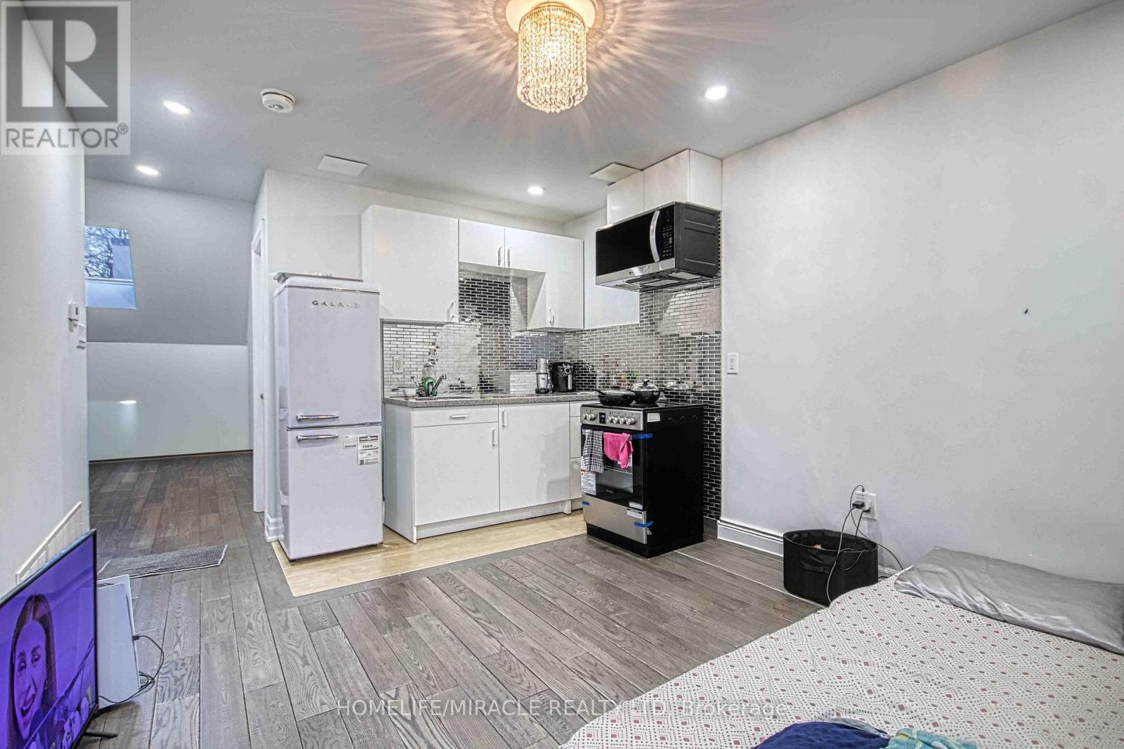 Blake-Jones detached with 3 legal units including new laneway studio, list $1,499,000 27