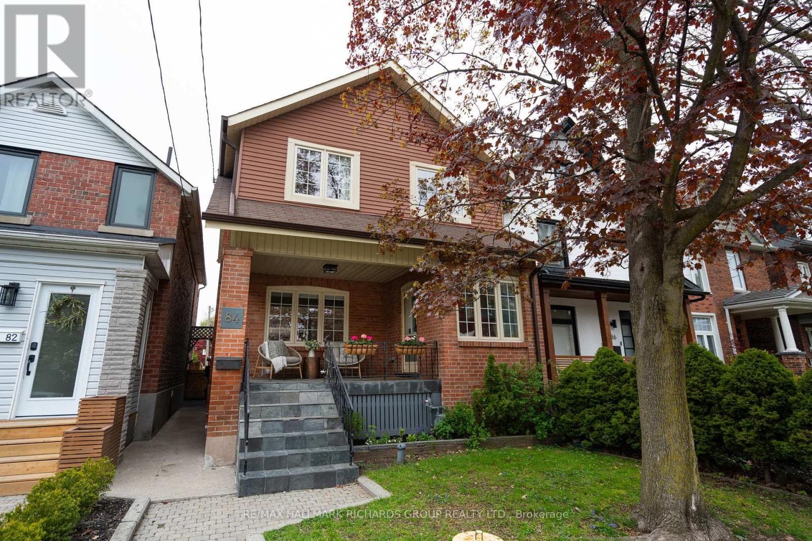 Renovated detached 2-storey in High Park North with laneway-access 2-car garage