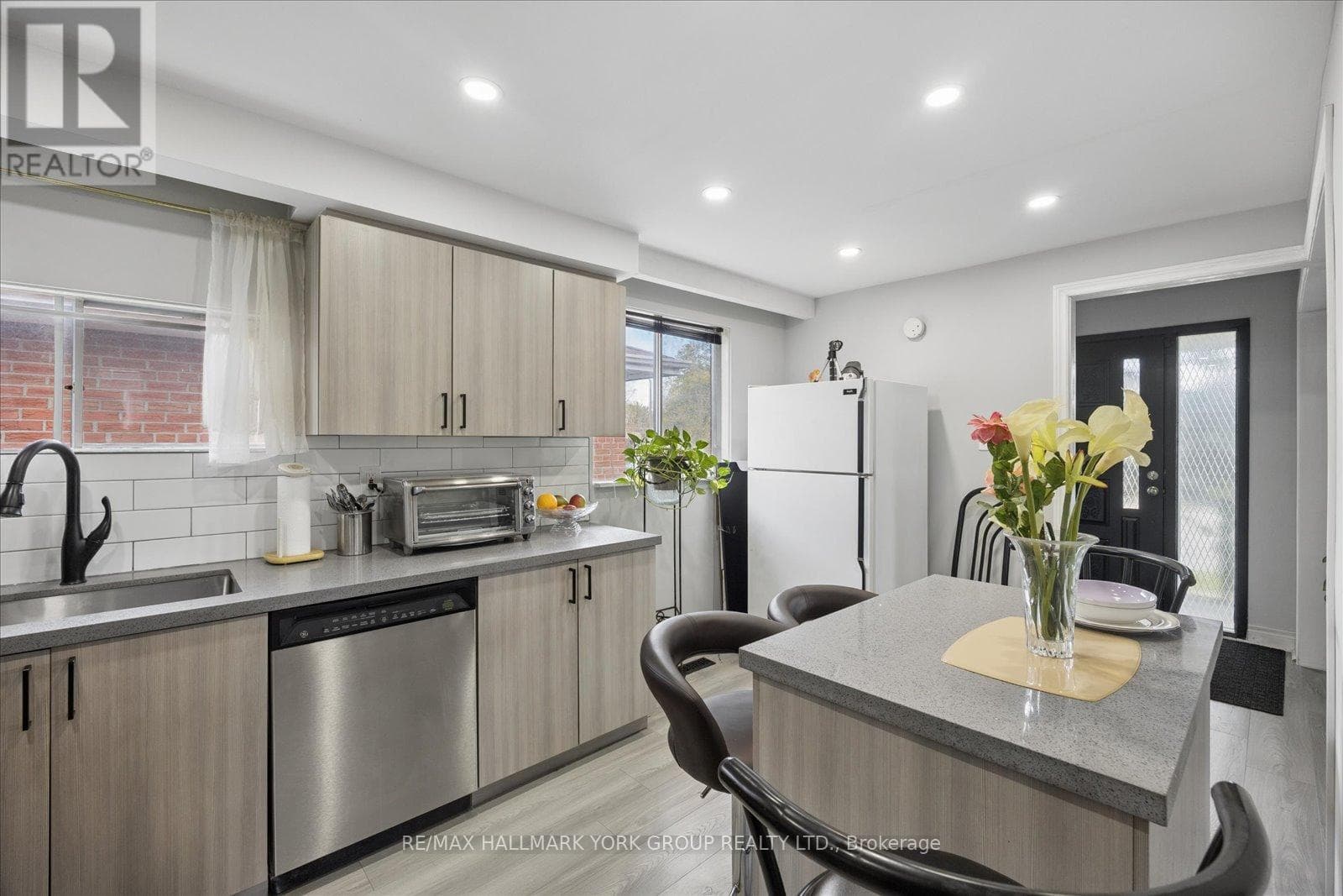 Brick bungalow in West Hill with 3+3 layout, separate-entrance basement, and second kitchen 16