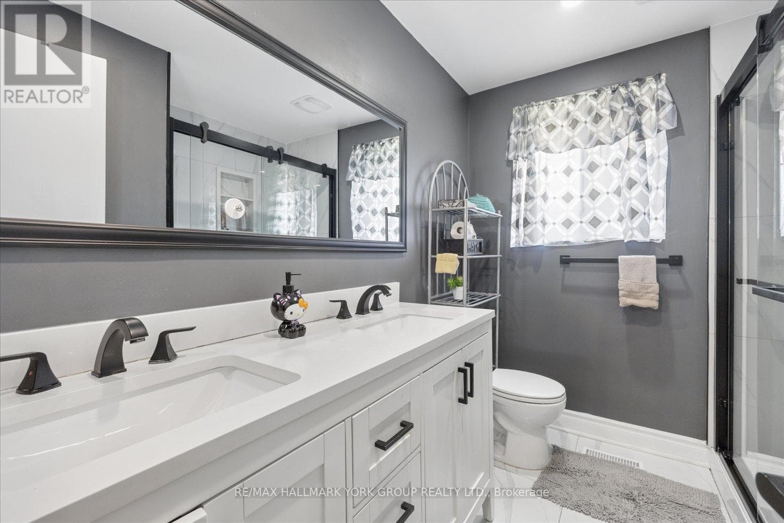 Brick bungalow in West Hill with 3+3 layout, separate-entrance basement, and second kitchen 24