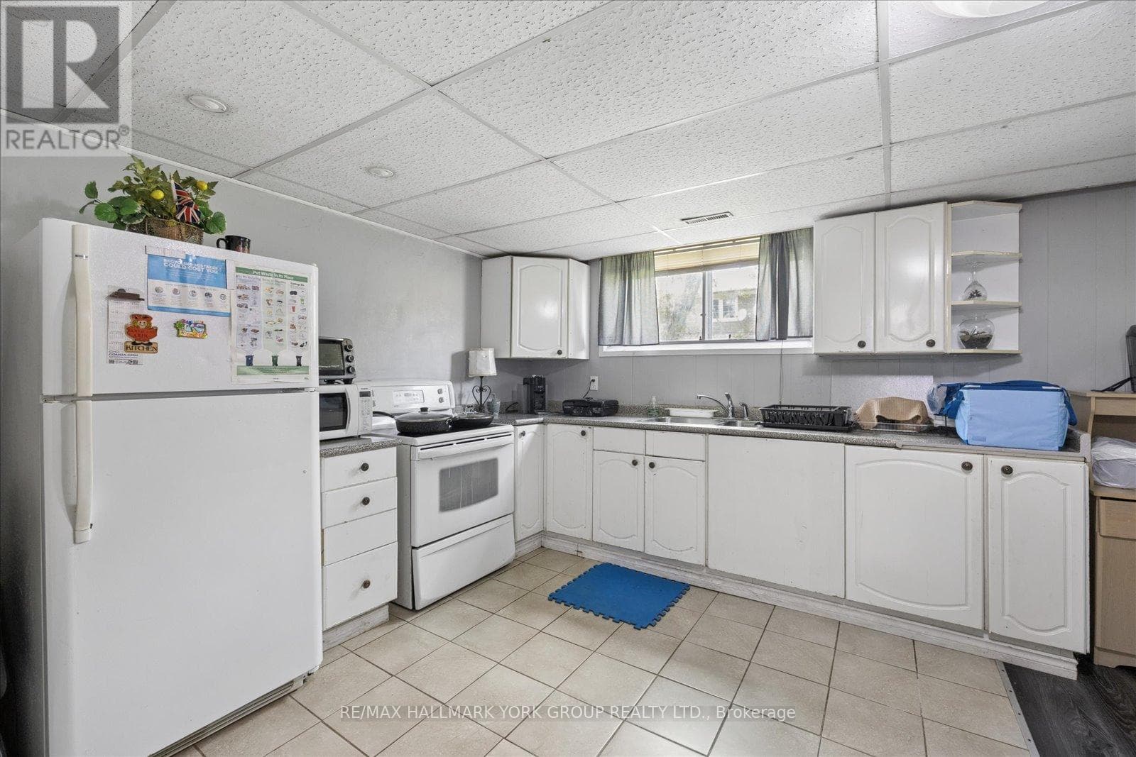 Brick bungalow in West Hill with 3+3 layout, separate-entrance basement, and second kitchen 30